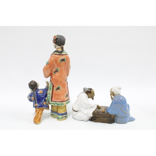 330 - Chinese Shiwan glazed figure group and another in polychrome enamels, (2) 29cm.