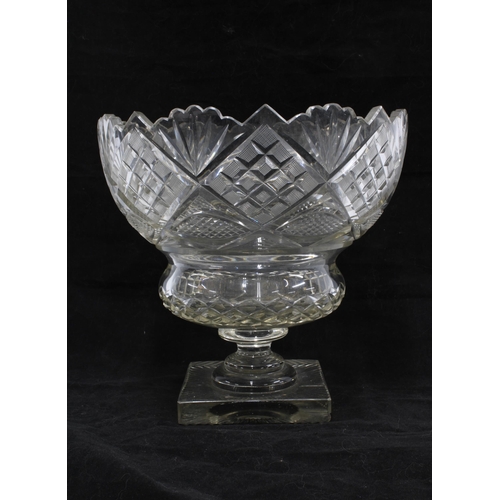 341 - Cut glass bowl with serrated rim , baluster knop and square foot, 23 x 23cm.