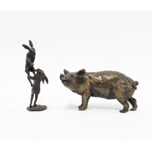 371 - Miniature bronze group of two hares, makers mark DM, 7cm high and a bronze pig, (2)