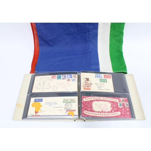 382 - An album with vintage  South African Rand bank notes, First Day covers and stamps, South Africa flag... 