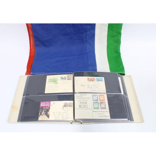 382 - An album with vintage  South African Rand bank notes, First Day covers and stamps, South Africa flag... 