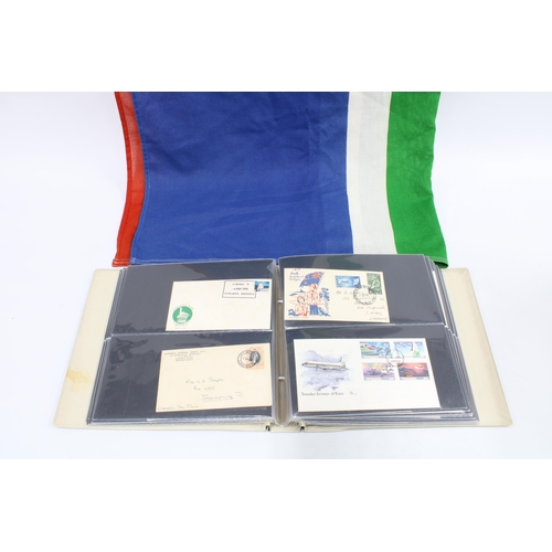 382 - An album with vintage  South African Rand bank notes, First Day covers and stamps, South Africa flag... 