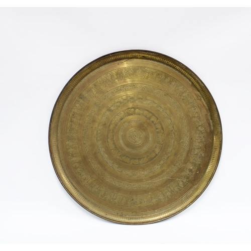 391 - Benares circular brass table top, 59cm.