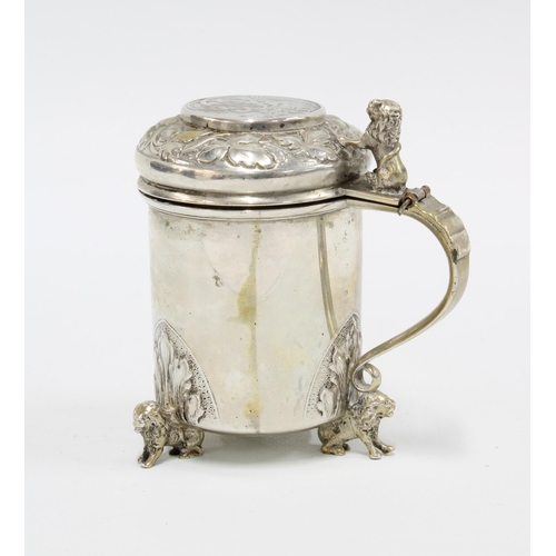 58 - Continental silver drum mustard, stamped MH 830S, hinged lid inset with a coin within a vine leaf bo... 