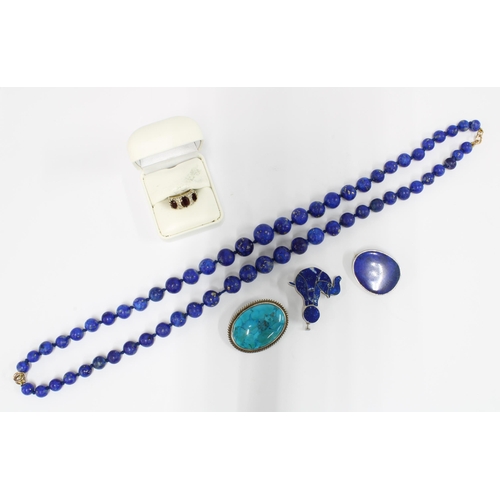 63 - Two white metal mounted lapis brooches and a doublet strand of beads with 9ct gold clasp together wi... 