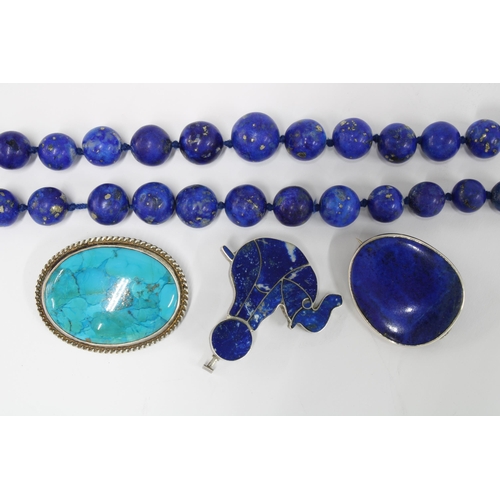 63 - Two white metal mounted lapis brooches and a doublet strand of beads with 9ct gold clasp together wi... 