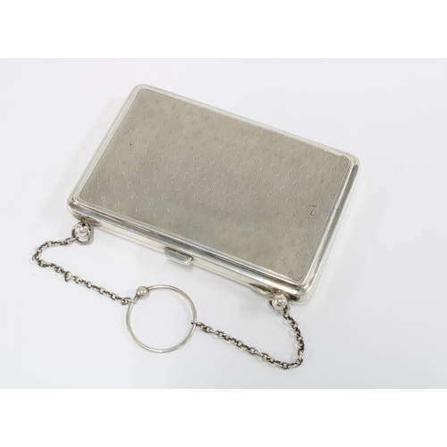 65 - George V silver purse / aide memoire, Sheffield 1915, engine turned decoration and green leather int... 