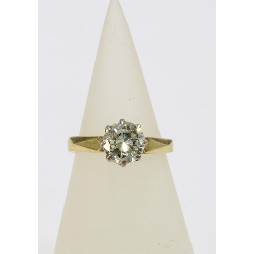 77 - 18ct yellow gold diamond solitaire ring with a round brilliant cut diamond weighing approx 1 carat, ... 