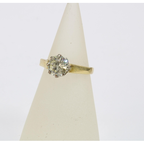 77 - 18ct yellow gold diamond solitaire ring with a round brilliant cut diamond weighing approx 1 carat, ... 