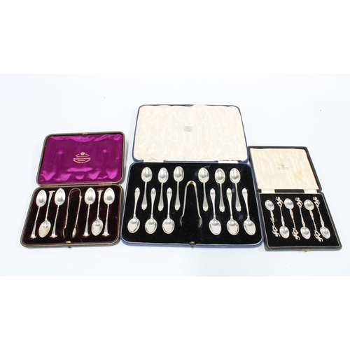 79A - A cased set of twelve silver teaspoons and matching sugar tongs, Sheffield 1931, cased set of six si... 