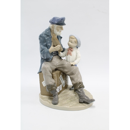 89 - Lladro figure of an old fisherman / sailor with a boy, 28cm