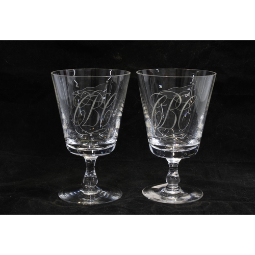 92 - A pair of etched glass rummers, the bowls with flag and bird motifs and monogrammed C B C, 13cm (2)