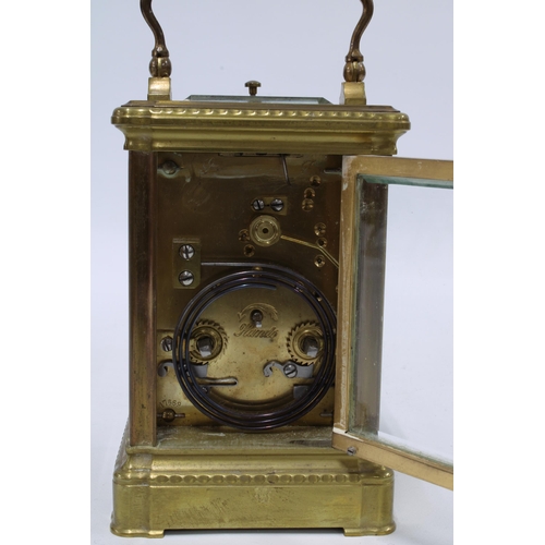 1 - Brass cased repeater carriage clock with bevelled glass panels, leather case