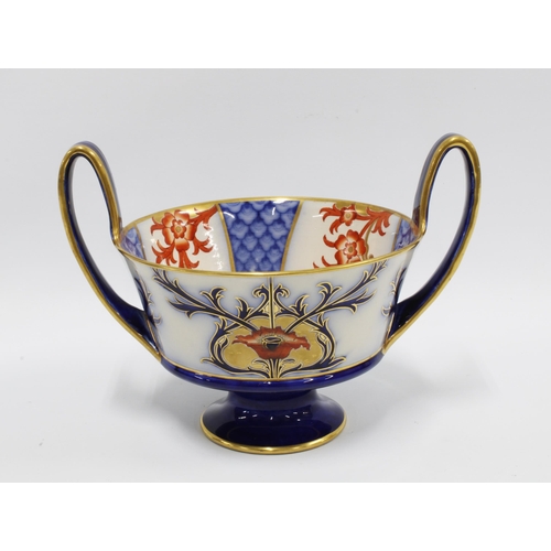 110 - Macintyre pottery Aurelian ware, floral and gilt footed bowl with handles, printed factory marks and... 