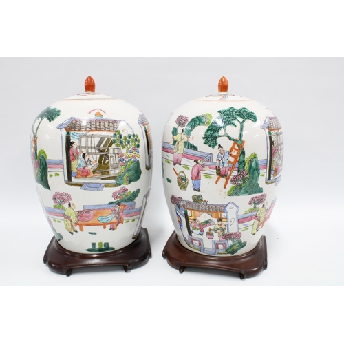 131 - Pair of Chinese famille rose vases with covers on wooden stands, 36cm (2)