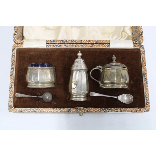 19 - Walker & Hall silver three piece condiment set, Birmingham 1956, in original fitted case