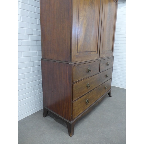 210 - Georgian flame mahogany linen press, the cornice with dentil frieze over blind fret carving and a pa... 