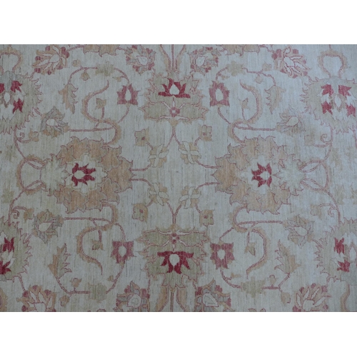 224 - Eastern carpet, beige field with terracotta floral pattern, 310 x 244cm.