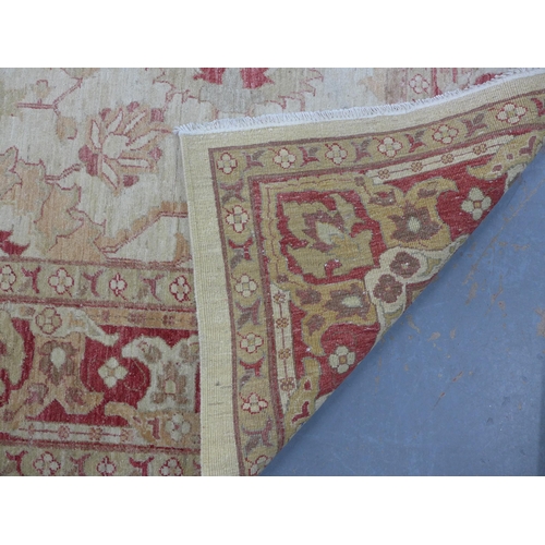 224 - Eastern carpet, beige field with terracotta floral pattern, 310 x 244cm.