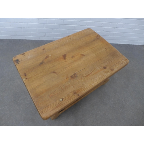 228 - Pine coffee table, rectangular top, bold legs and undertier, 90 x 50 x 60cm.