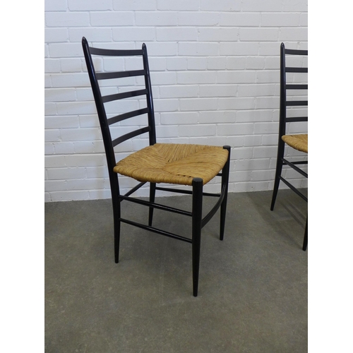 234 - Set of four Scandinavian ebonised chairs with woven rush seats, 41 x 89 x 40cm. (4)