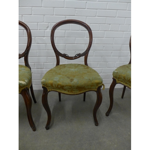 239 - Set of four Victorian rosewood balloon back chairs, 44 x 86 x 41cm. (4)