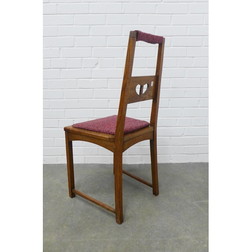 247 - An arts & craft oak chair, in the manner of Charles Rennie Mackintosh, the splat back with pierced h... 