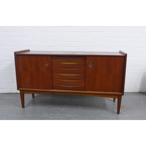 269 - Brantorps of Sweden mid century teak sideboard, with three central drawers flanked by cupboard doors... 