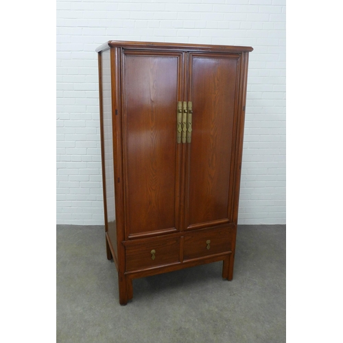 278 - Asian hardwood cabinet, rectangular top over two cupboard doors with shelved interior, stylised bras... 