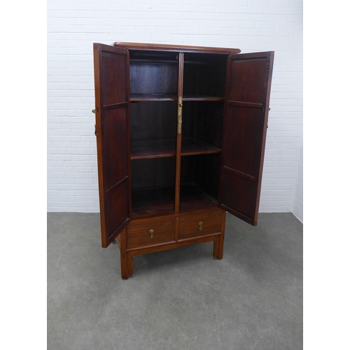 278 - Asian hardwood cabinet, rectangular top over two cupboard doors with shelved interior, stylised bras... 