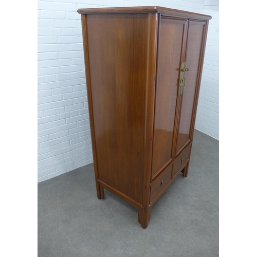 278 - Asian hardwood cabinet, rectangular top over two cupboard doors with shelved interior, stylised bras... 