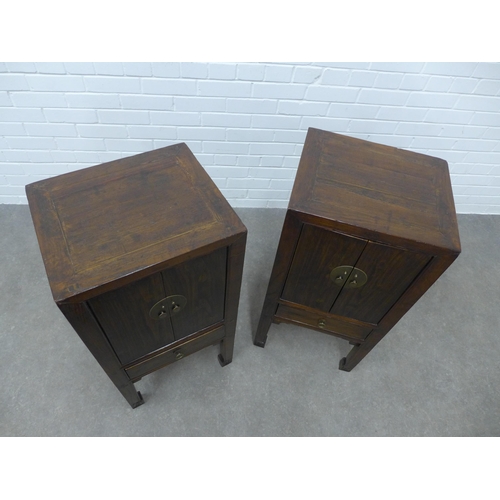 286 - Pair of Asian hardwood bedside cabinets, square tops with two doors with brass fittings, raised on s... 