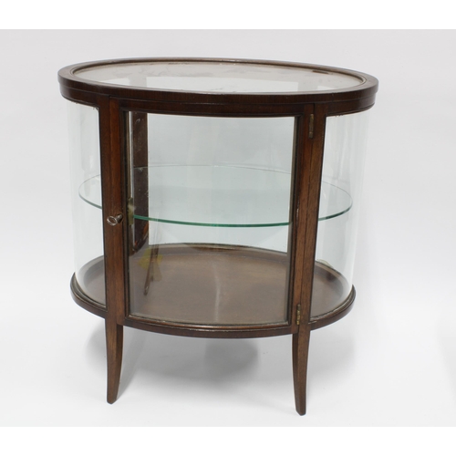 299 - Miniature mahogany oval vitrine cabinet, with glass sides and internal glass shelf, on tapering outs... 