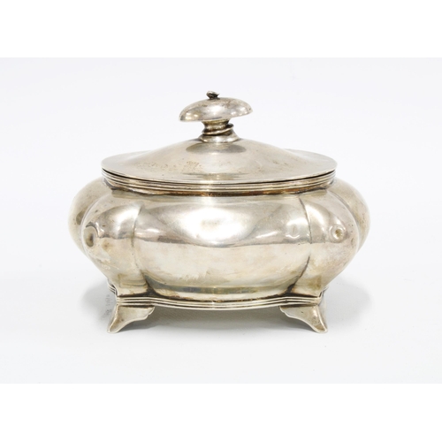 3 - George V silver tea caddy of lobed form, the hinged cover opening to reveal the original silver cadd... 
