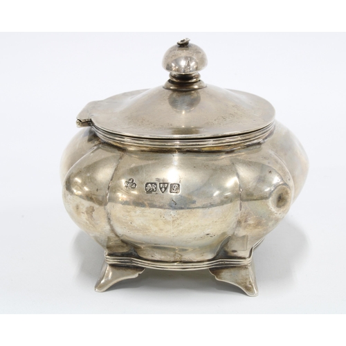 3 - George V silver tea caddy of lobed form, the hinged cover opening to reveal the original silver cadd... 