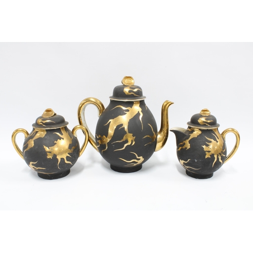 305 - Japanese black and gilt dragon teaset (41)