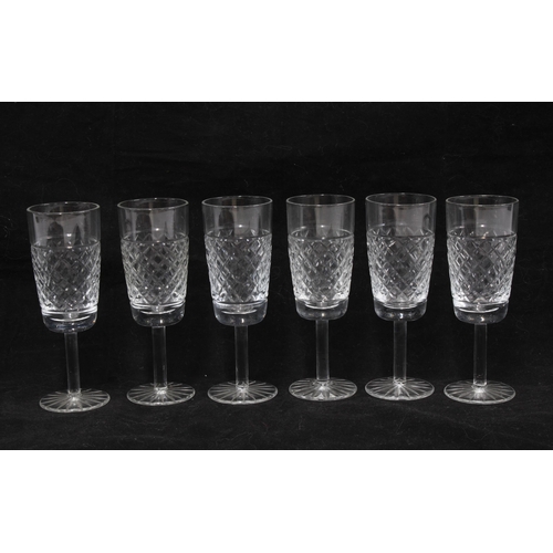 311 - Two cut glass decanters & stoppers, set of four whisky tumblers and set of six wine glasses (12)