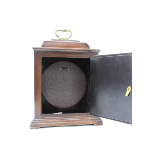 326 - Mahogany cased mantle clock with silvered dial and roman numerals, presentation plaque dated 1958, 2... 