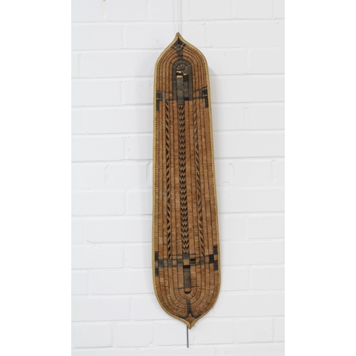 369 - Solomon Islands wicker shield, black stain geometric decoration and with handle, 82 x 16cm