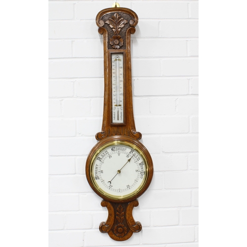 385 - Oak cased banjo wall barometer with floral carving, 91 x 26cm