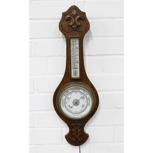 386 - Oak cased banjo wall barometer with fleur de lys carving, 57 x 19cm