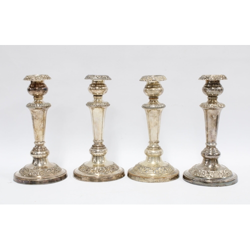 390 - Set of four Epns rococo style candlesticks, 24cm high  (4)