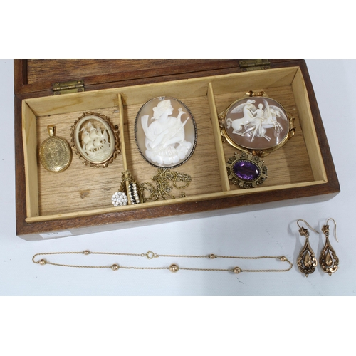 44 - Jewellery box containing a 15ct gold chain, Victorian yellow metal earrings, 2 Cameo brooches, faux ... 