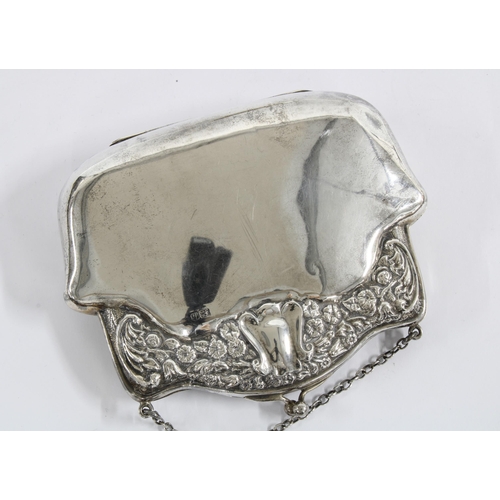 59 - Early 20th century silver purse, Chester 1913, with foliate repousee border and a green watered silk... 