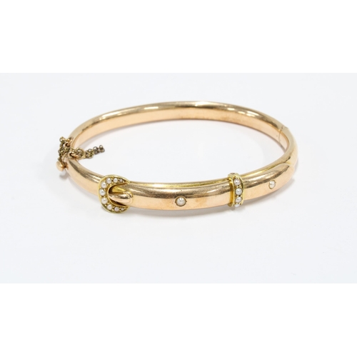 72 - 9ct gold rose gold bangle and an unmarked yellow metal bangle with seed pearl (2)