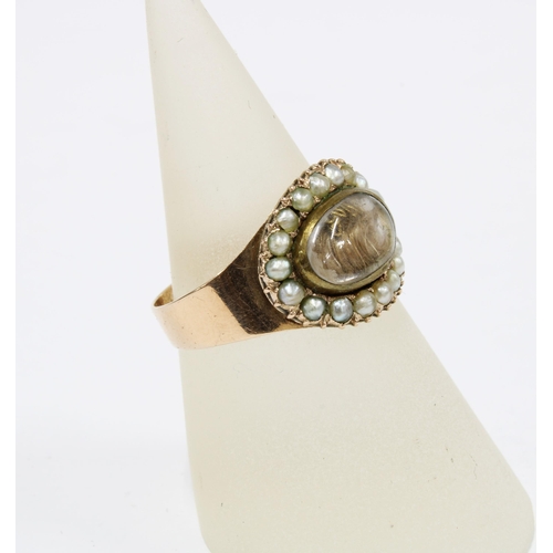 74 - 19th century gold and seed pearl mourning ring with glazed panel containing hair, the inner inscribe... 