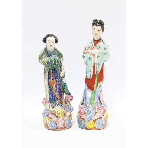 78 - Two Chinese polychrome enamelled female figures, taller 25cm (2)