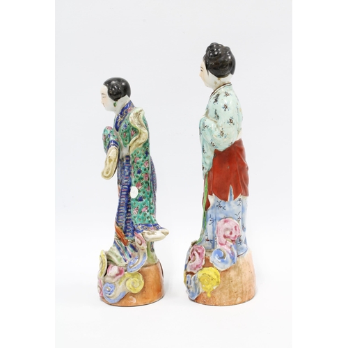 78 - Two Chinese polychrome enamelled female figures, taller 25cm (2)