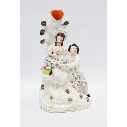 82 - Staffordshire flatback spill vase with two figures under an apple  tree, 32cm