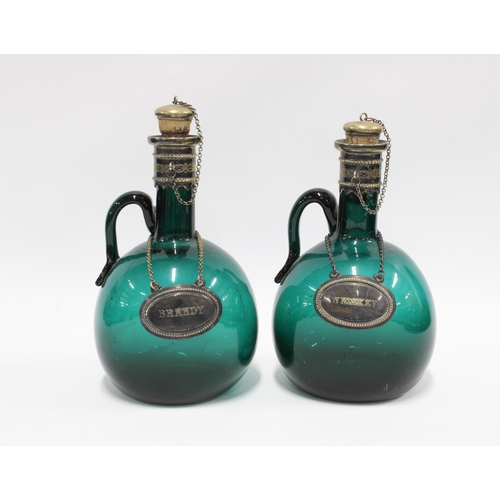 89 - Two green glass and Epns mounted decanters with 'Whisky' and 'Brandy' labels, 20cm (2)